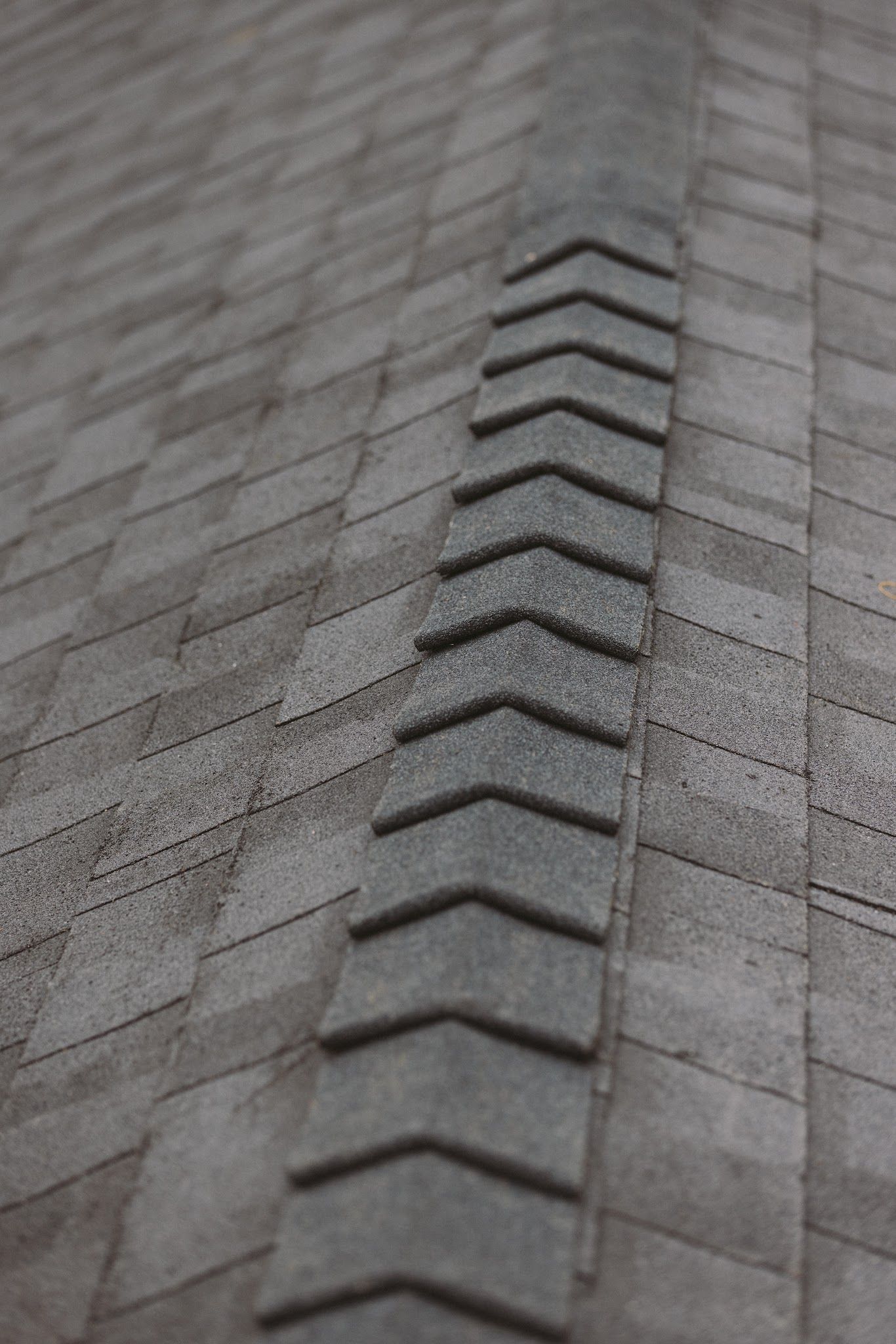 Close view of newly installed architectural ridge-cap shingles