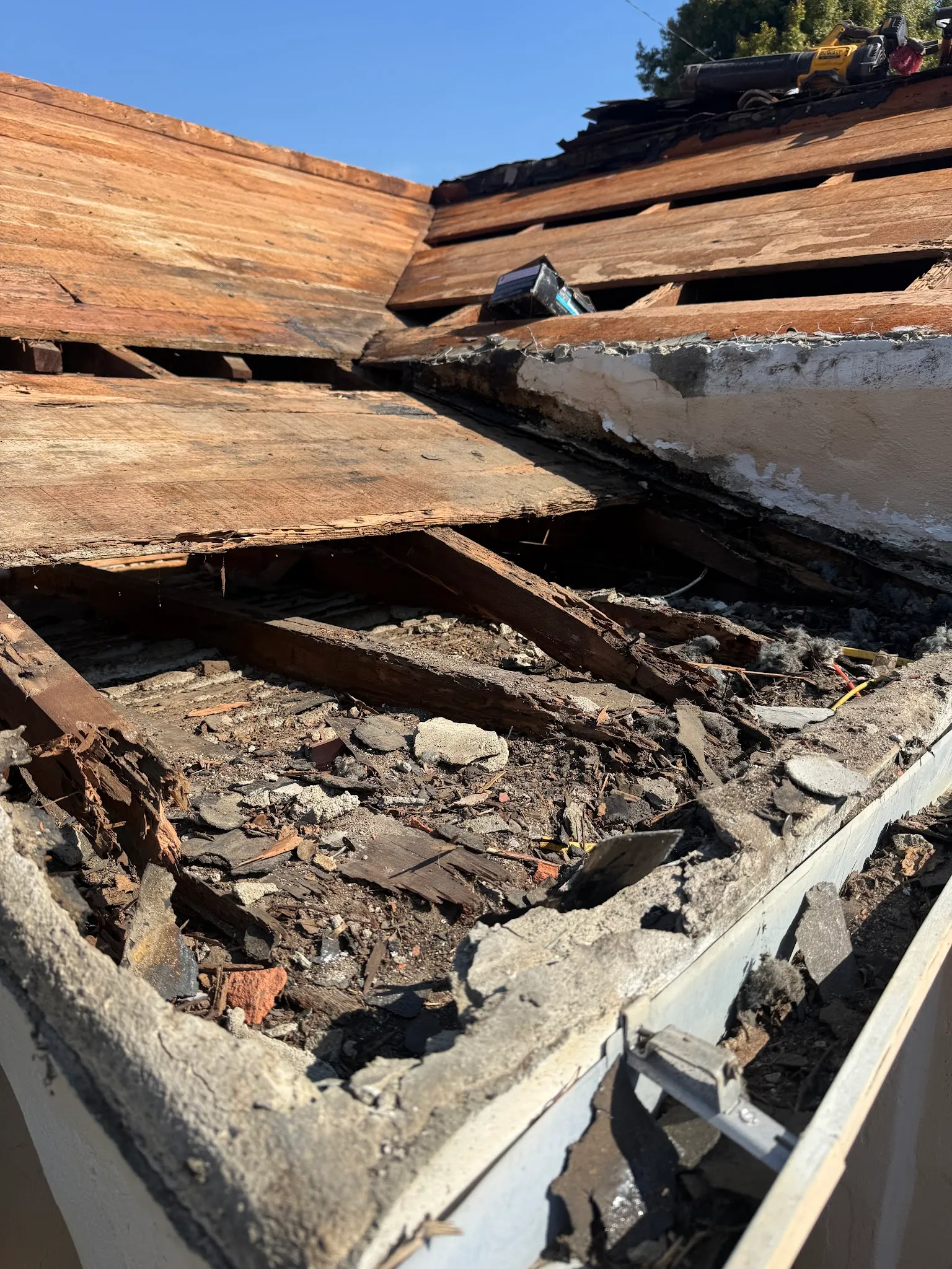 Rotted roof decking exposed during tear-off